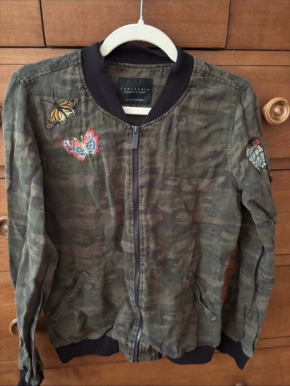 Sanctuary women’s size small Camouflage Bomber Jacket with Butterfly Patches
